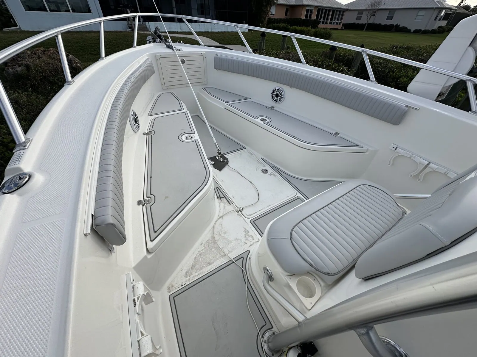 Bow seating reupholstered in grey marine vinyl