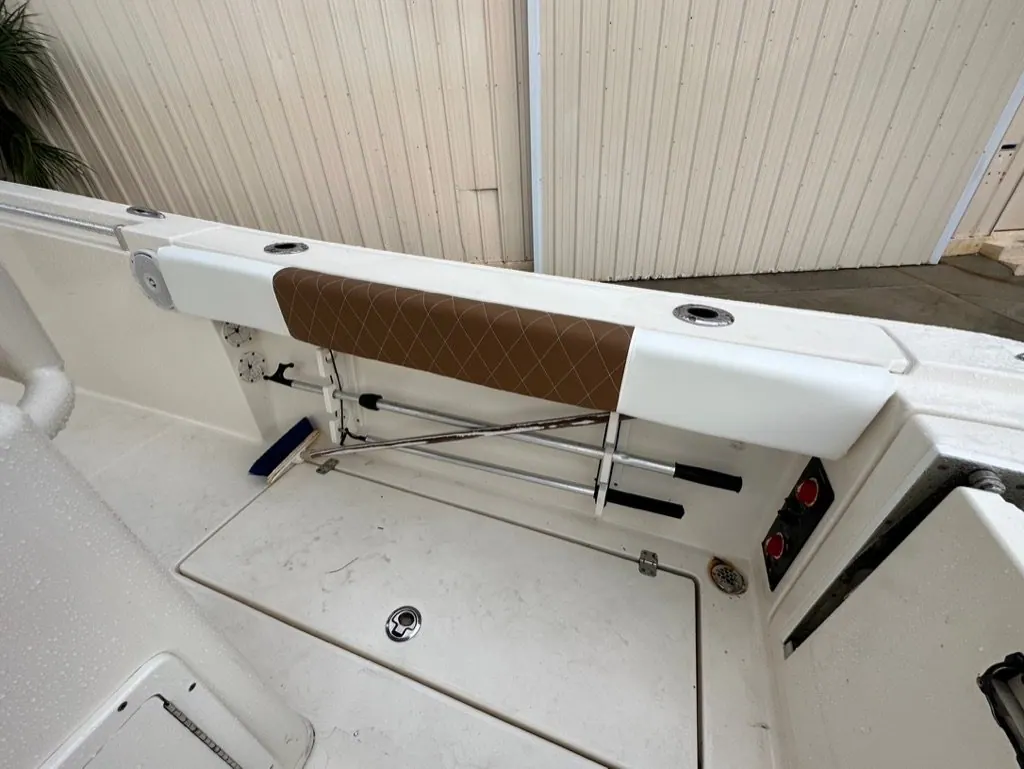 Diamond-stitched gunwale bolster pads on a center console boat