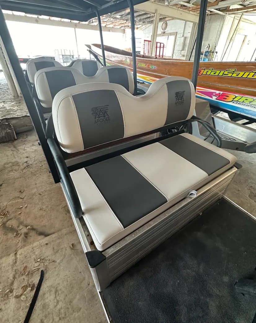 Close-up of a reupholstered golf cart seat
