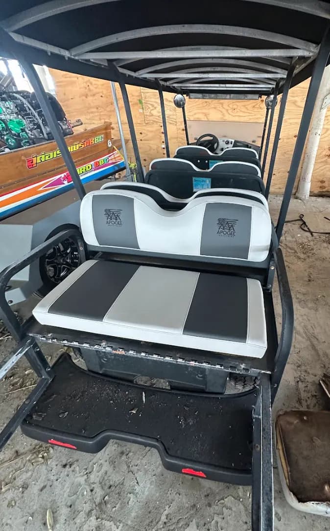 Golf cart seats reupholstered in grey and black vinyl