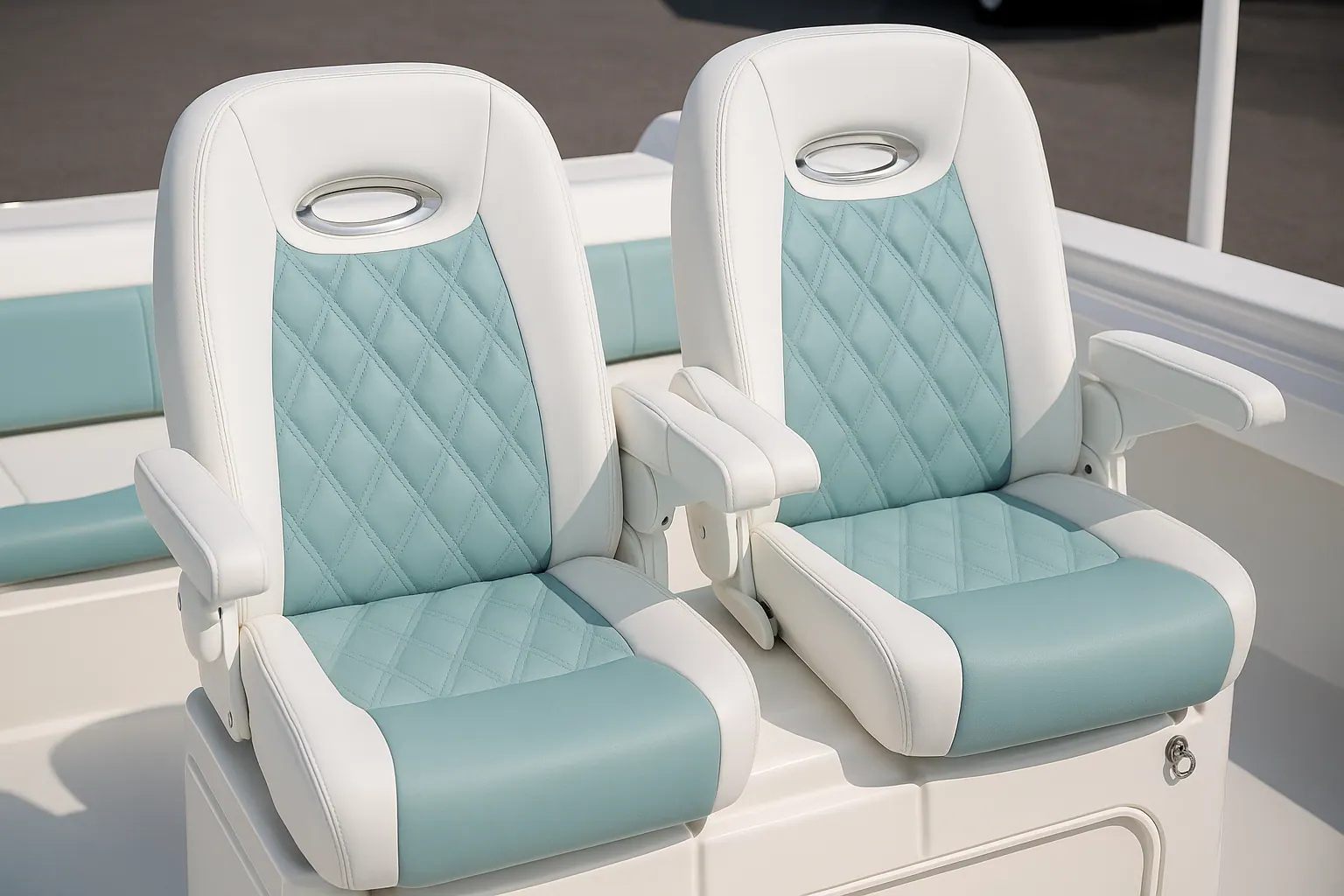 Pair of helm seats in white and teal diamond-stitched marine vinyl