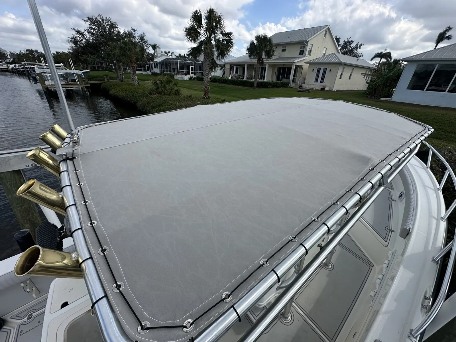 Grey marine canvas T-top on a center console boat