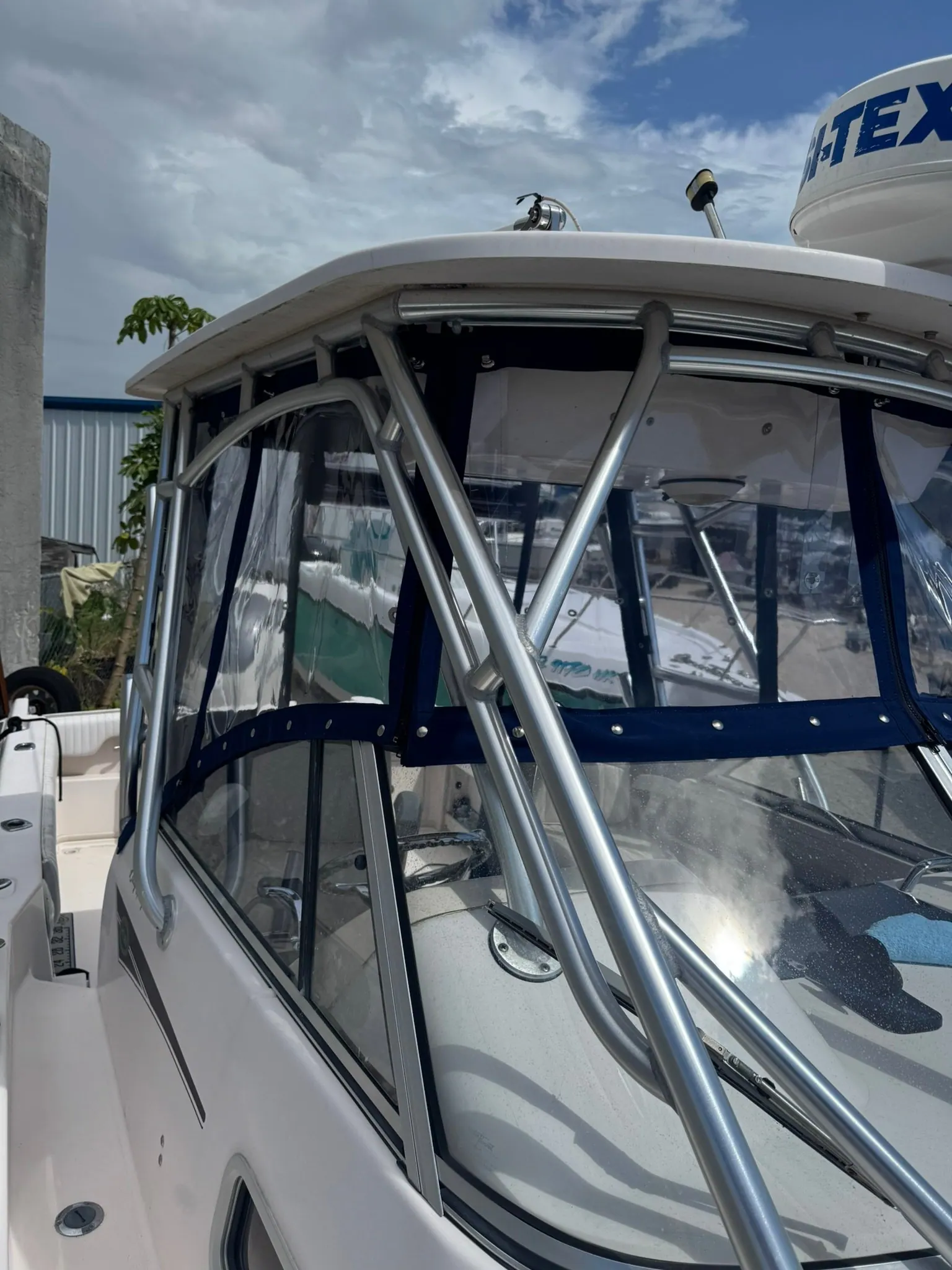 Clear vinyl side curtains on a custom T-top enclosure