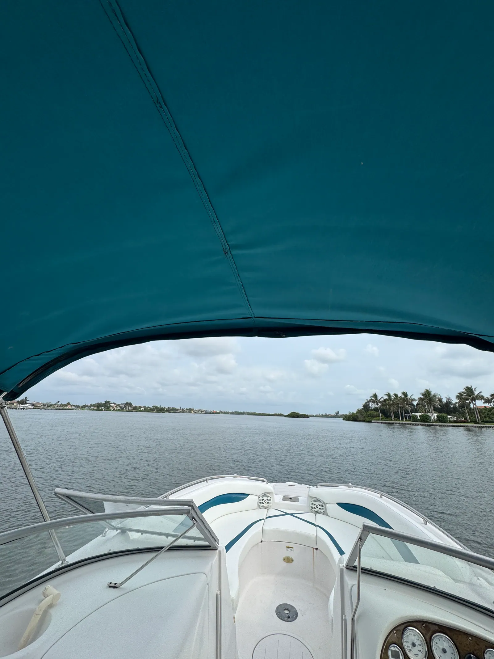 View forward under the new teal bimini top