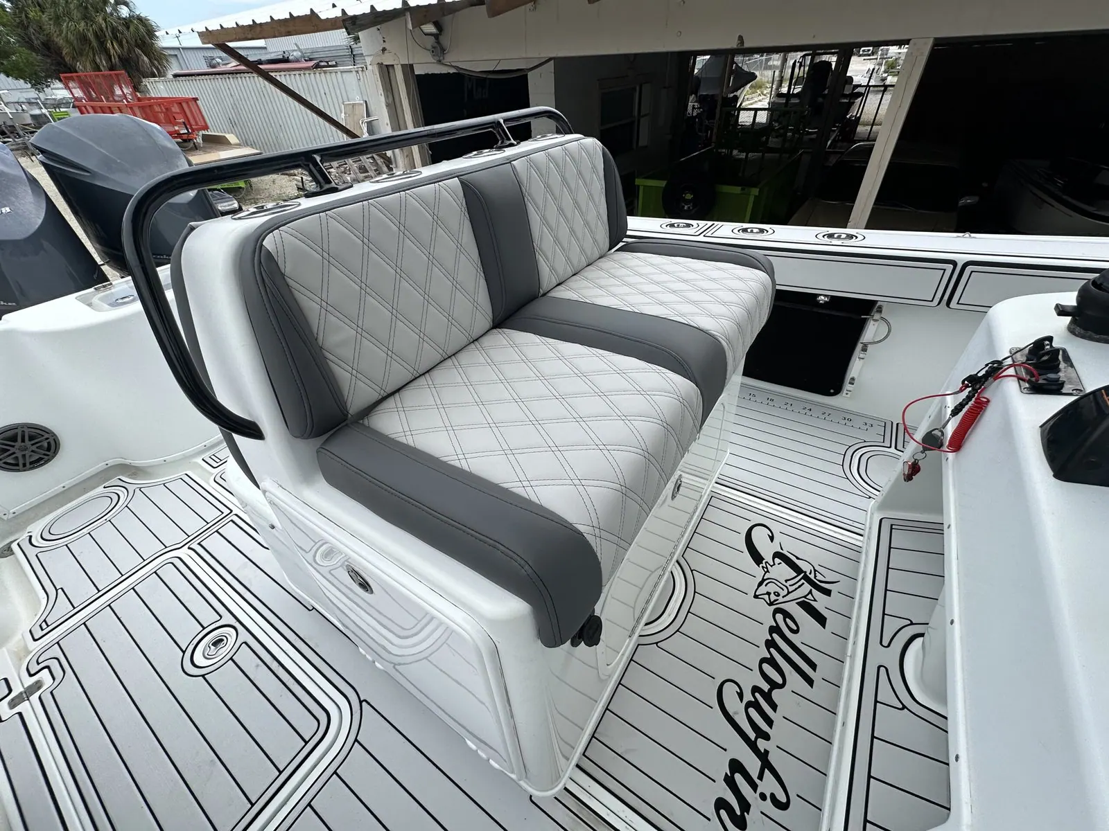 Yellowfin helm bench seat with grey diamond stitching and a charcoal center panel